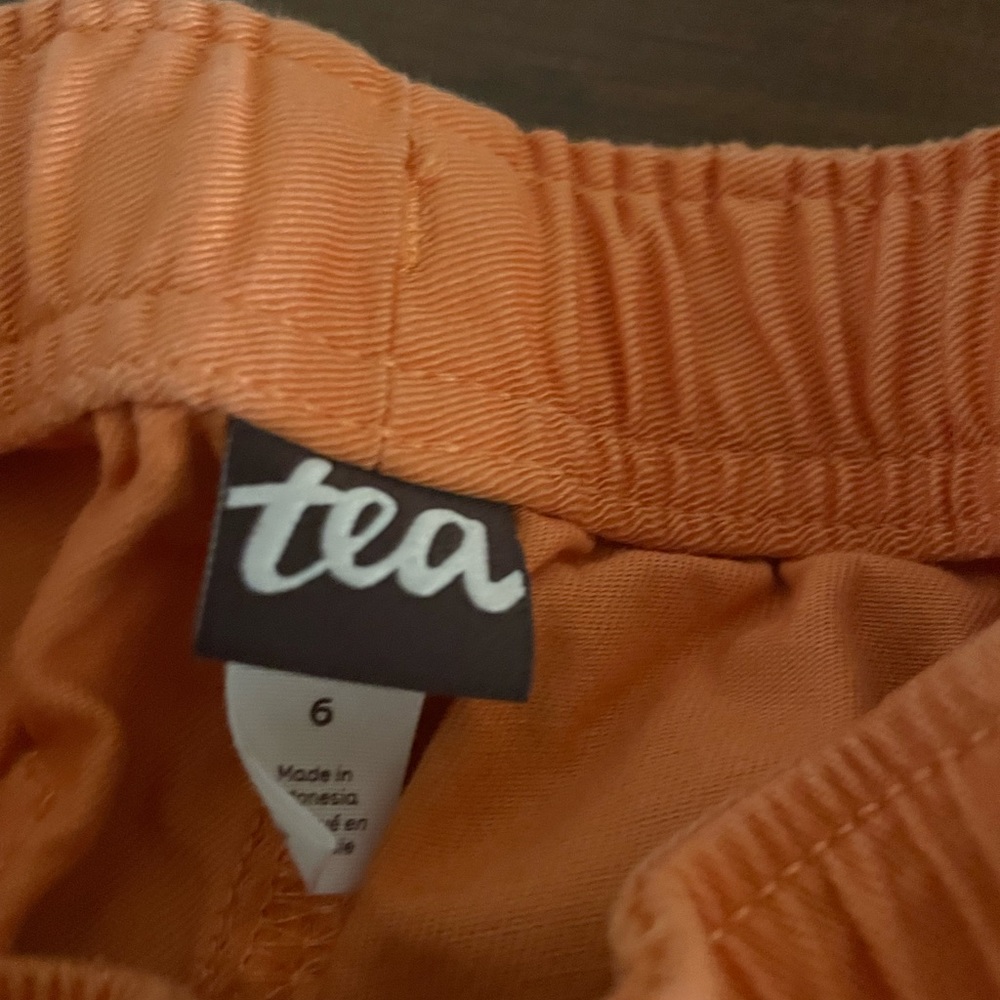 Orange shorts Tea
